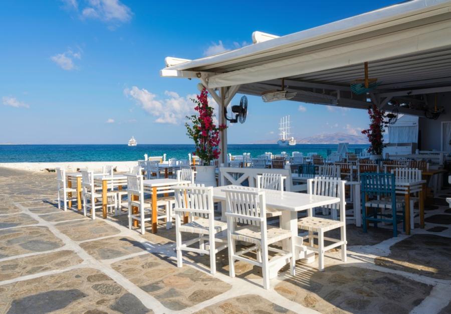 A couple dining in a traditional taverna in Naxos