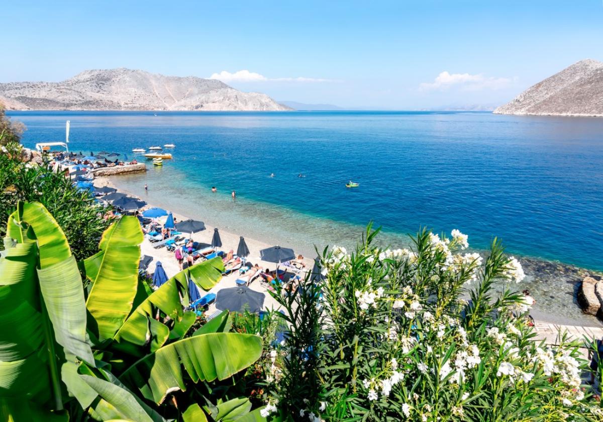 Nos Beach with sunbeds and umbrellas