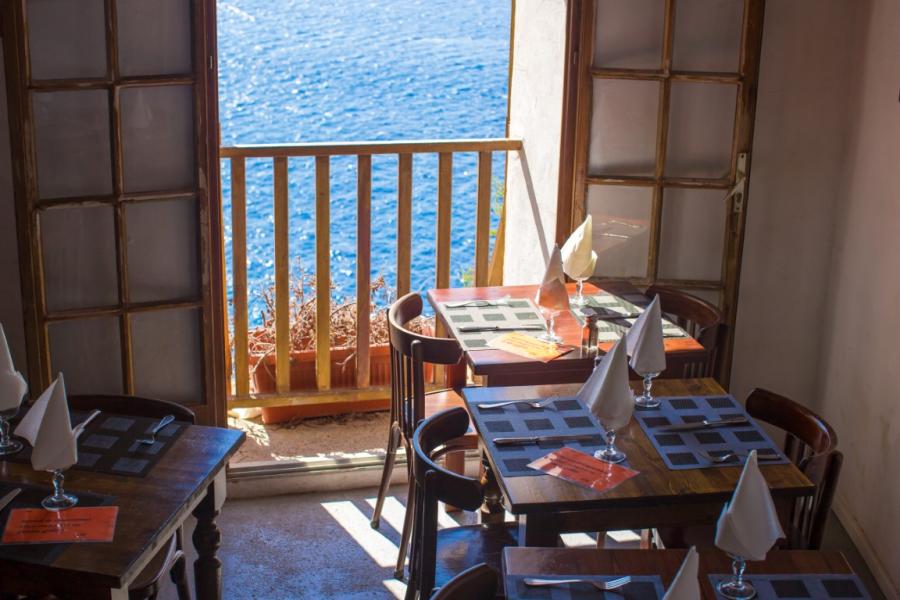 A couple dining in a restaurant in Crete