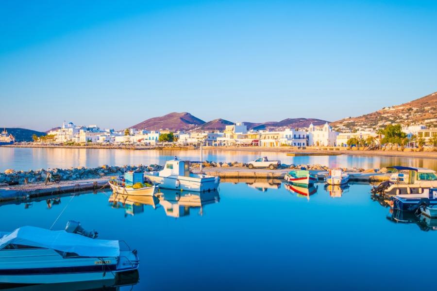 A couple exploring the charming village of Naousa in Paros